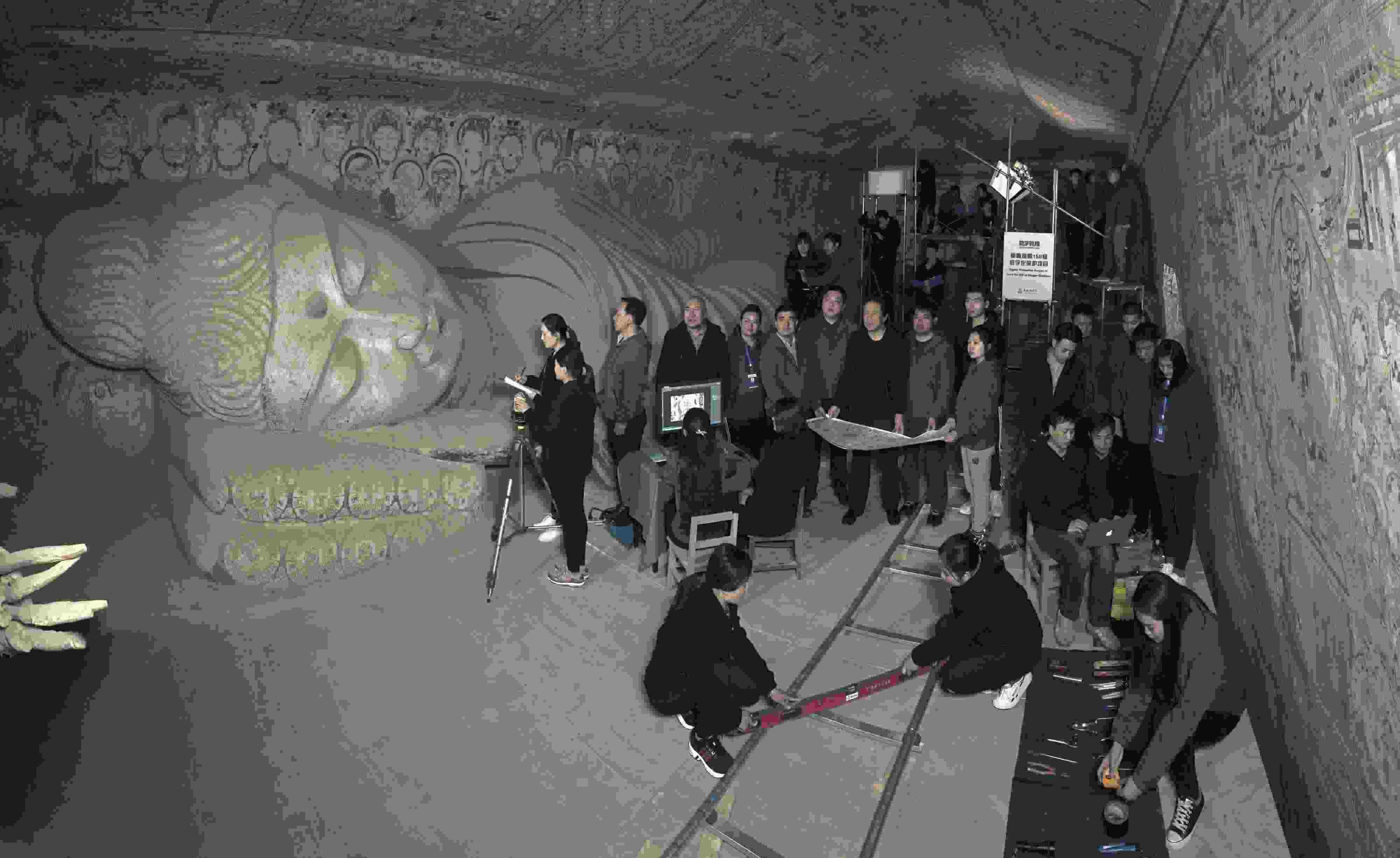 敦煌研究院文物數(shù)字化團隊在莫高窟第158窟工作現(xiàn)場。敦煌研究院供圖