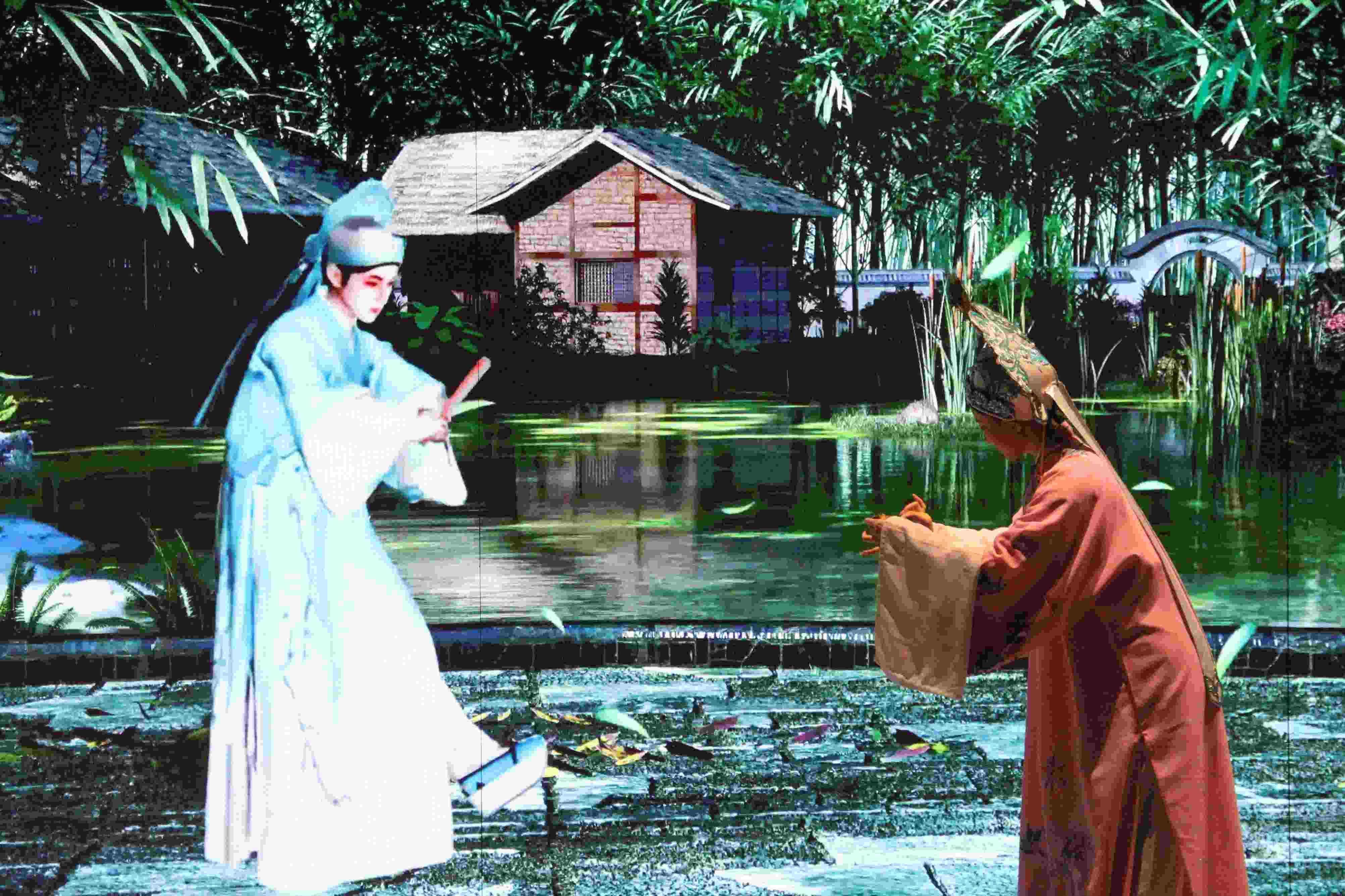 真人演員與虛擬人演員在“元啟金陵”南京數(shù)字文化客廳出演《梁山伯與祝英臺》經(jīng)典選段。受訪者供圖