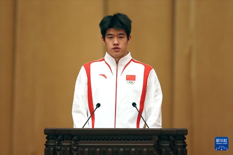 11月15日，游泳運(yùn)動(dòng)員潘展樂在報(bào)告會(huì)上發(fā)言。新華社記者 李明 攝